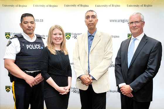(L to R) Superintendent Alfredo Bangloy, Assistant Criminal Operations Officer at RCMP F Division Headquarters in Regina; Michelle Rempel, Minister of State for Western Economic Diversification; Dr. Yasser Morgan, Associate Professor in the Faculty of Engineering and Applied Science; Dr. Thomas Chase, Provost and Vice President (Academic). (Photo courtesy of Trevor Hopkin - U of R Photography)